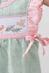 Green swiss dot cross sheep ruffle bubble