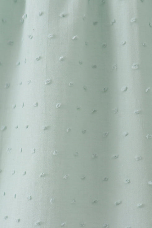 Green swiss dot cross sheep ruffle dress
