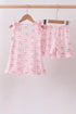 Pink bow print scalloped ruffle shorts set