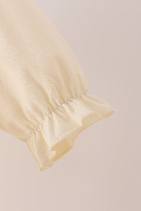 cream-football-french-knot-ruffle-dress-sophias-style-2