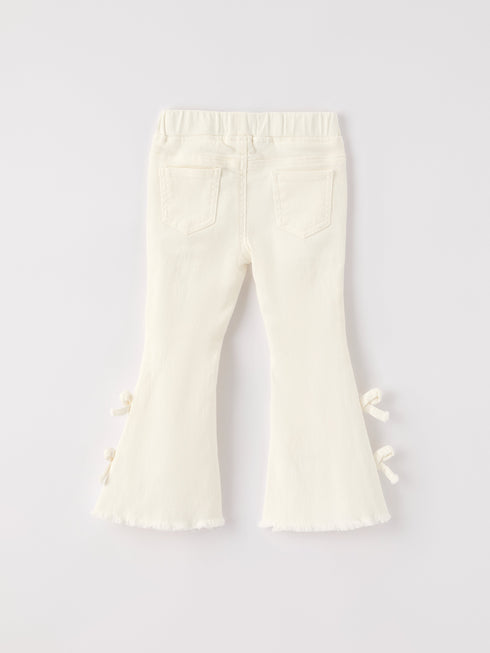 christmas-charming-white-bell-bottom-pants-with-cute-bows Sophia's Style-2