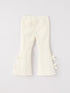 christmas-charming-white-bell-bottom-pants-with-cute-bows Sophia's Style-2