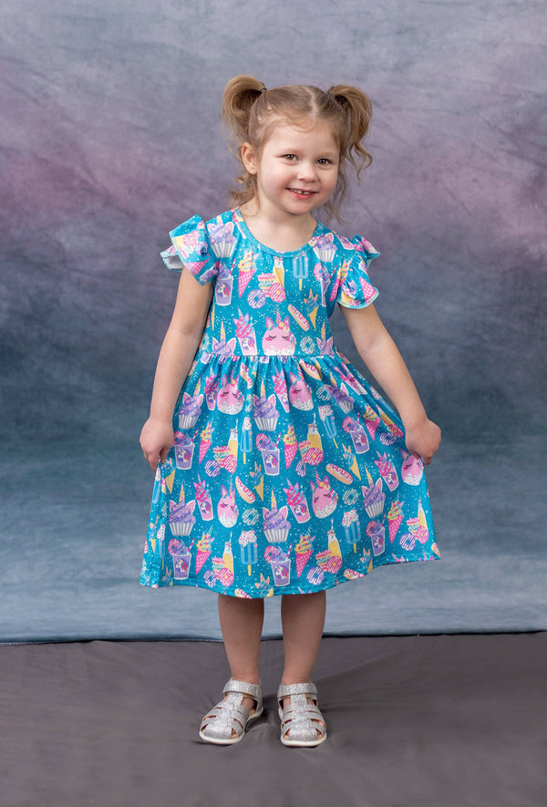 magical-unicorn-treats-milk-silk-flutter-dress Great Lakes kids - Sophia's StyleFlutter Dress-1