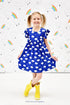 rainbow-showers-milk-silk-flutter-dress Great Lakes kids - Sophia's StyleFlutter Dress-1