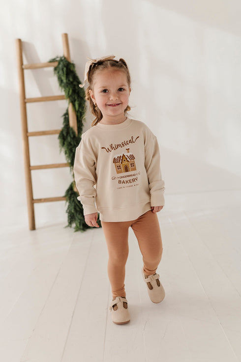 girls-boxy-sweatshirt-in-whimsical-gingerbread-bakery-baby-sprouts-sophias-style-2