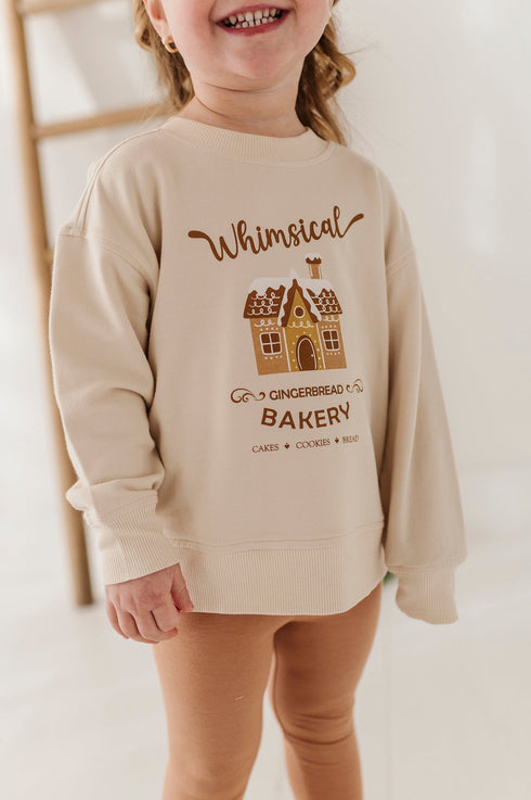girls-boxy-sweatshirt-in-whimsical-gingerbread-bakery-baby-sprouts-sophias-style-3