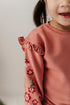 girls-ruffle-sweatshirt-in-holly-dust-floral-baby-sprouts-sophias-style-4
