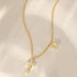 gold-plated-sterling-silver-cross-necklace-with-sparkling-cz-and-floral-charm-Sophia's Style-3