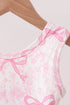 pink-performance-bow-print-scalloped-dress-abby-evie-sophias-style-5
