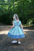 vintage-teal-garden-picnic-dress-w-hairbow Little Miss Marmalade-Sophia's Style-https://cdn.shopify.com/s/files/1/0303/8344/0012/files/4_627d44bf-a19b-4f76-9723-c3c966b5966a.jpg?v=1758370834