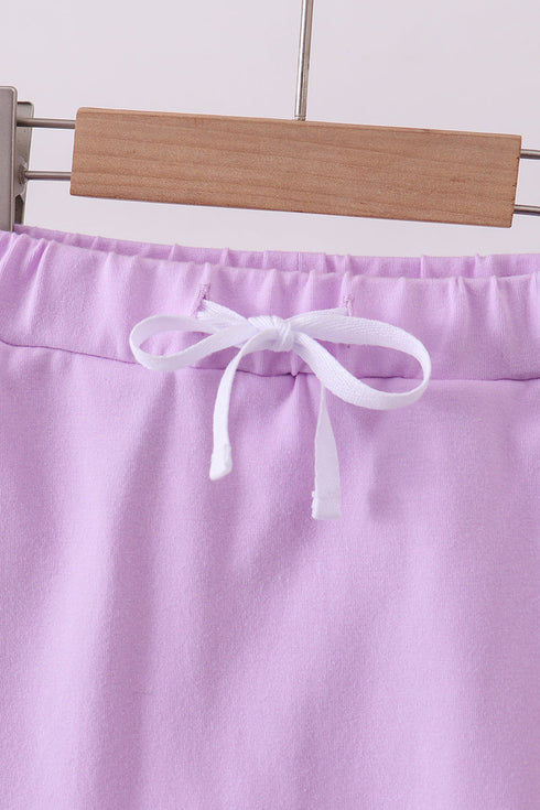 Purple scallop hem bow skort