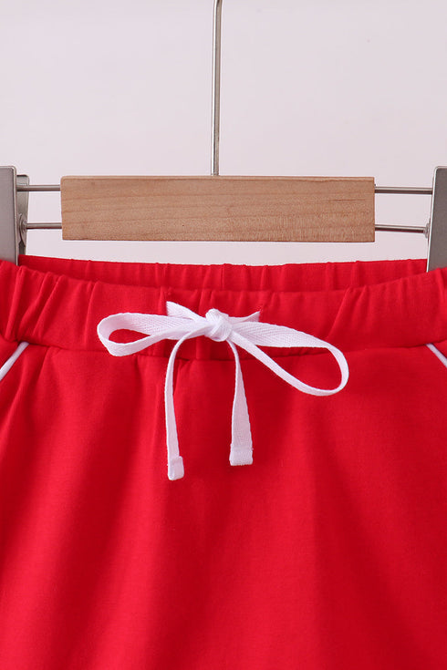 Red scallop hem bow skort