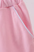 Pink scallop hem bow skort