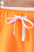 Orange scallop hem bow skort
