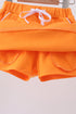 Orange scallop hem bow skort