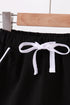 Black scallop hem bow skort