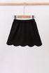 Black scallop hem bow skort