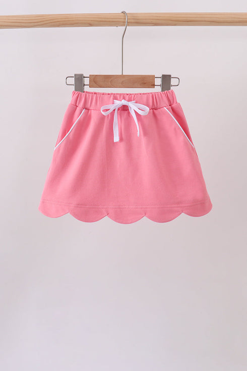 Deep pink scallop hem bow skort