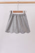 Grey scallop hem bow skort