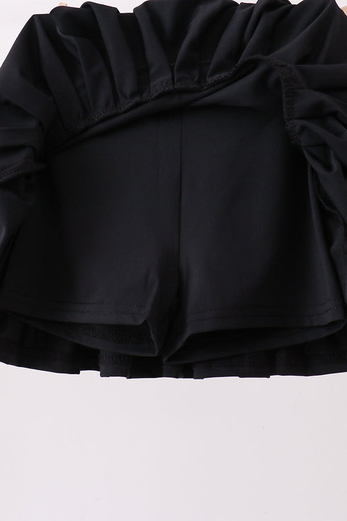 Black pleated skort