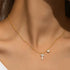 gold-plated-sterling-silver-cross-necklace-with-sparkling-cz-and-floral-charm-Sophia's Style-2