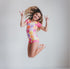 bright-smiley-shortie-leotard-oopsie-daisy-sophias-style-2