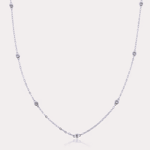 cosmic-halo-bezel-dainty-necklace-with-7-round-cut-cubic-zirconia-Sophia's Style-2