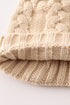 Beige pompom cable beanie hat
