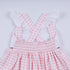Pink character hand smocked gingham ruffle dress