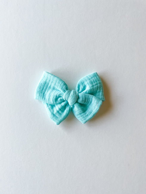 bright-turquoise-pinwheel-bow Boosh Baby - Sophia's Style-1
