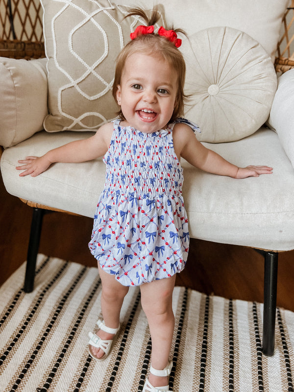 smocked-red-white-and-bows-bamboo-bubble-romper at Sophia's Styleclothes-1