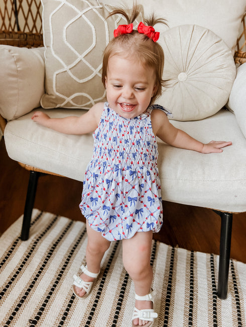 smocked-red-white-and-bows-bamboo-bubble-romper at Sophia's Style-3
