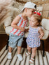 smocked-red-white-and-bows-bamboo-bubble-romper at Sophia's Style-6