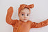 ruffle-2-way-zip-romper-ribbed-rust Presley Couture at Sophia's Style--2