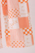 orange-tennessee-patchwork-ruffle-jumpsuit-abby-evie-sophias-style-3