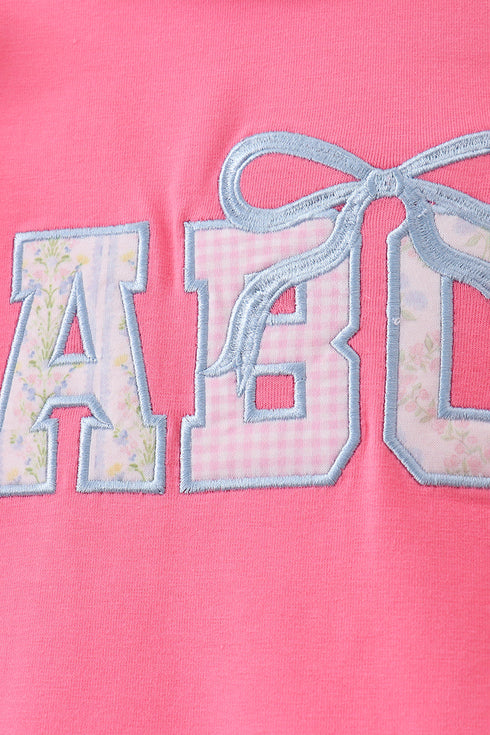 pink-abc-applique-ruffle-dress-abby-evie-sophias-style-3