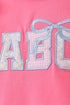 pink-abc-applique-ruffle-dress-abby-evie-sophias-style-3