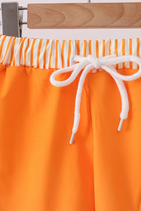 orange-football-swim-trunks-abby-evie-sophias-style-2