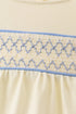 Cream smocked bubble