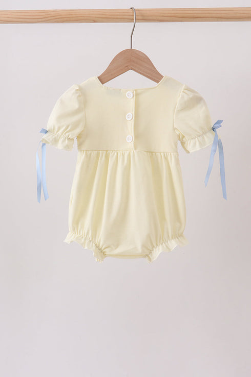 Cream smocked bubble
