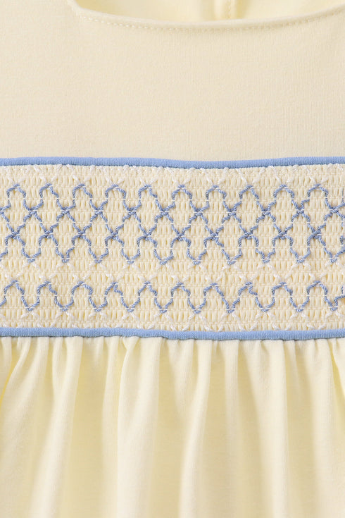 Cream smocked ruffle dress