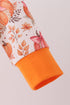orange-pumpkin-print-ruffle-romper-sophias-style-3