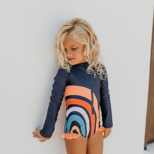 mia-rainbow-navy-zip-rash-guard-swimsuit-oopsie-daisy-sophias-styleSwimsuit-1