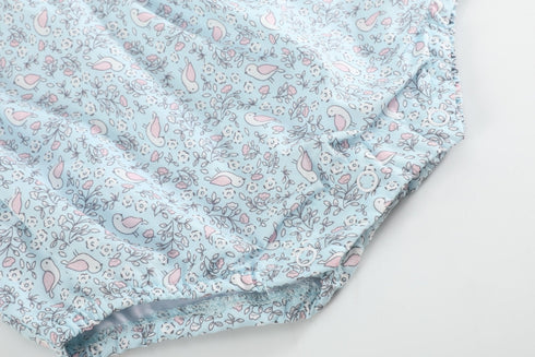 floral-blue-dove-smocked-flutter-bubble-romper-lil-cactus-sophias-style-4