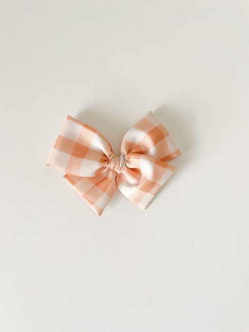 peach-gingham-pinwheel Boosh Baby - Sophia's Style-1