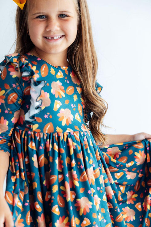 gobble-til-you-wobble-3-4-sleeve-ruffle-twirl-dress-sophias-style-4