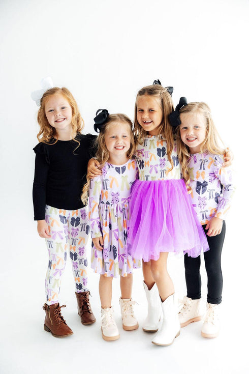 tied-with-a-boo-lavender-l-s-ruffle-tee-sophias-style-4