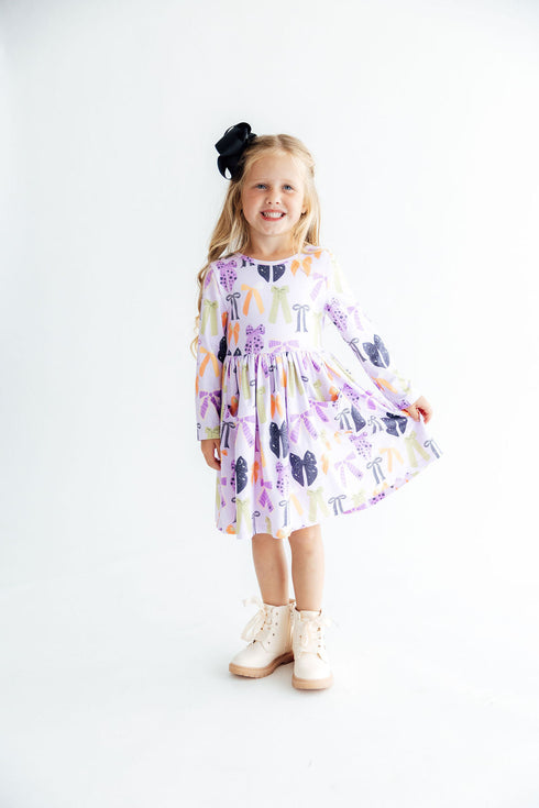 tied-with-a-boo-lavender-l-s-pocket-twirl-dress-sophias-style-3