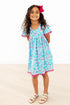 aqua-garden-pom-pom-dress-sophias-style-2