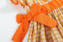 orange-gingham-ruffle-pumpkin-bow-dress-lil-cactus-sophias-style-6